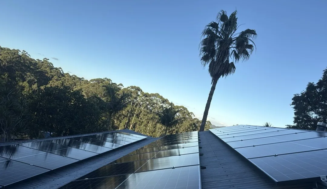 Rooftop solar panel arrays installed on a metal roof